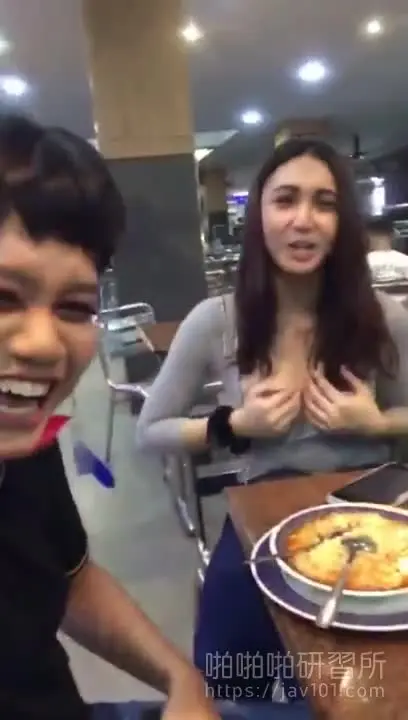 Beautiful breast girl exposed in restaurant